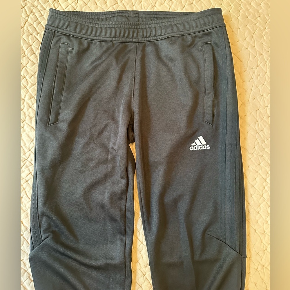 Adidas warm up pants, black stripes, size small. Like new.